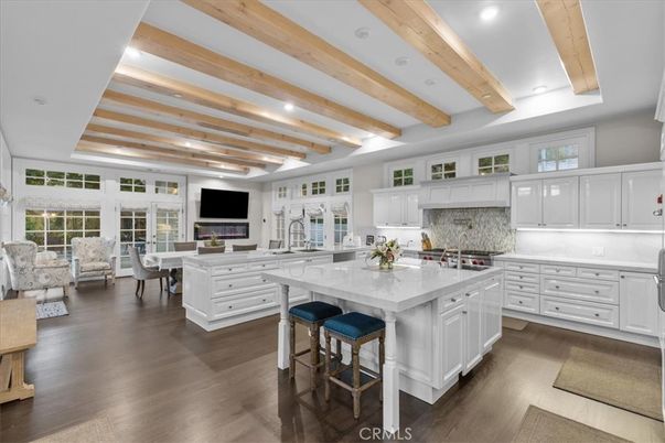 Dining room, Interior, Kitchen, Living room, Recessed Lighting, Stainless Steel Appliances, Wooden Beams, Wood Texture Flooring