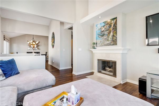 Dining room, Fireplace, Interior, Living room, Pendant Lights, Recessed Lighting, Wood Texture Flooring