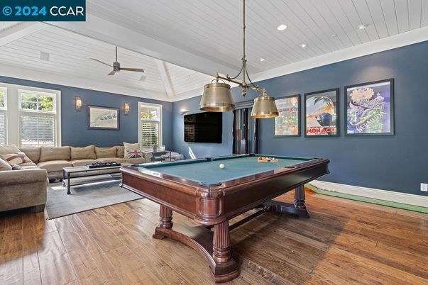 Billiard Table, Game Room, Interior, Living room, Pendant Lights, Recessed Lighting, Wood Texture Flooring