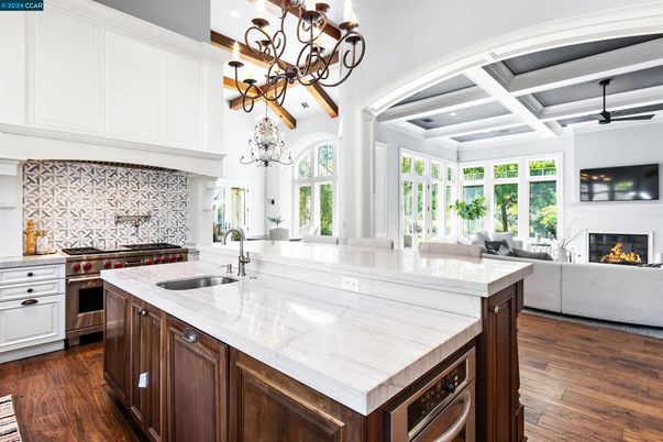Chandelier, Fireplace, Interior, Kitchen, Living room, Recessed Lighting, Wooden Beams, Wood Texture Flooring