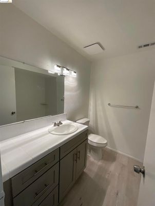 Bathroom, Dual Sink Vanities, Interior, Tile Countertops, Wood Texture Flooring