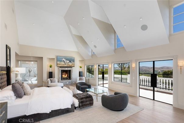 Bedroom, Fireplace, Interior, Living room, Recessed Lighting, Wood Texture Flooring