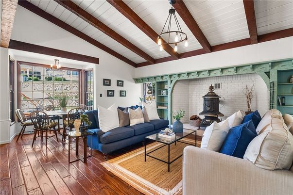 Dining room, Fireplace, Interior, Living room, Pendant Lights, Stone Walls, Wooden Beams, Wood Texture Flooring