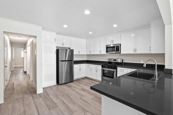 Interior, Kitchen, Recessed Lighting, Stainless Steel Appliances, Wood Texture Flooring