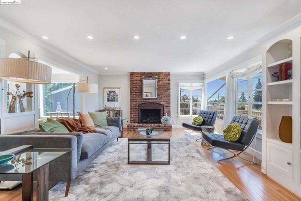 Fireplace, Interior, Living room, Recessed Lighting, Stone Walls, Wood Texture Flooring