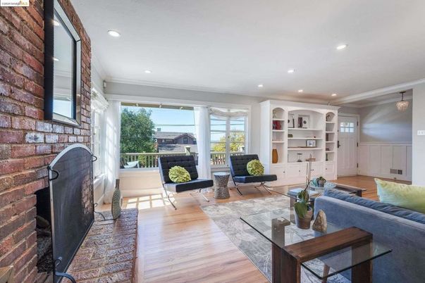 Fireplace, Interior, Living room, Recessed Lighting, Stone Walls, Wood Texture Flooring
