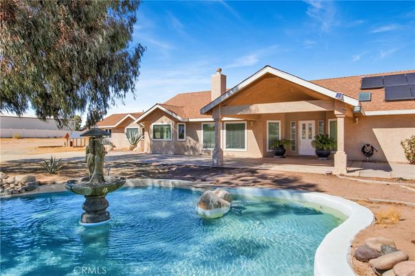 Exterior, Pool, Solar Panels