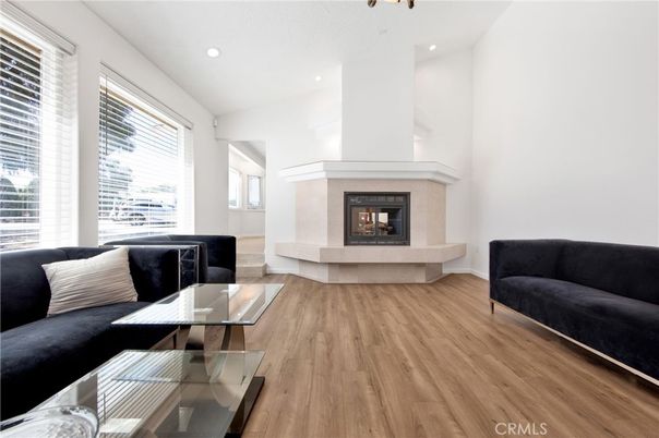 Fireplace, Interior, Living room, Recessed Lighting, Wood Texture Flooring