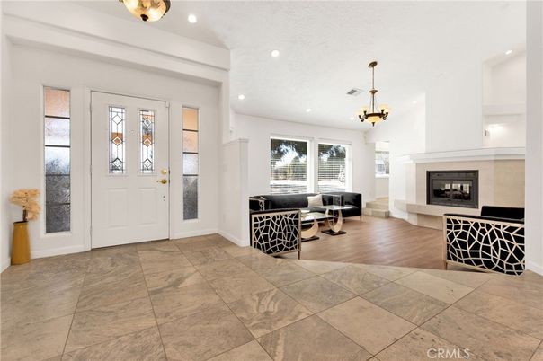 Chandelier, Fireplace, Interior, Living room, Recessed Lighting, Wood Texture Flooring