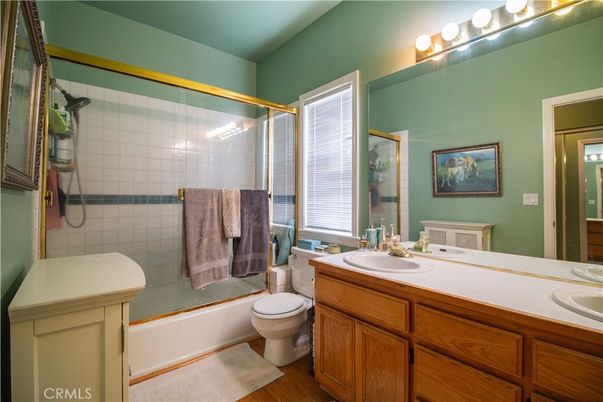Bathroom, Dual Sink Vanities, Glass Shower, Interior, Wood Texture Flooring