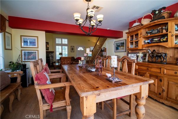 Chandelier, Dining room, Fireplace, Interior, Wood Texture Flooring
