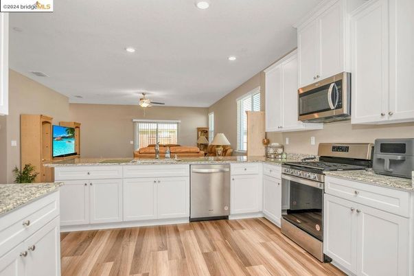 Interior, Kitchen, Recessed Lighting, Stainless Steel Appliances, Wood Texture Flooring