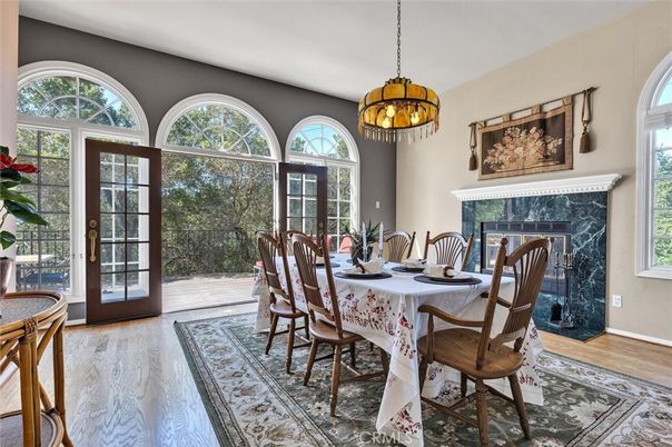 Chandelier, Dining room, Fireplace, Interior, Pendant Lights, Wood Texture Flooring