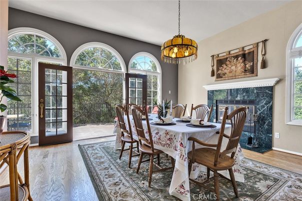 Chandelier, Dining room, Fireplace, Interior, Pendant Lights, Wood Texture Flooring