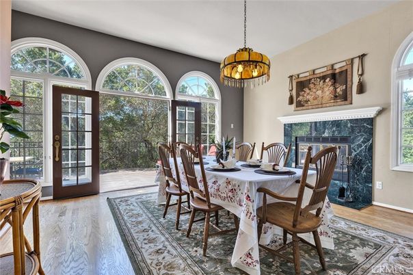 Chandelier, Dining room, Fireplace, Interior, Pendant Lights, Wood Texture Flooring