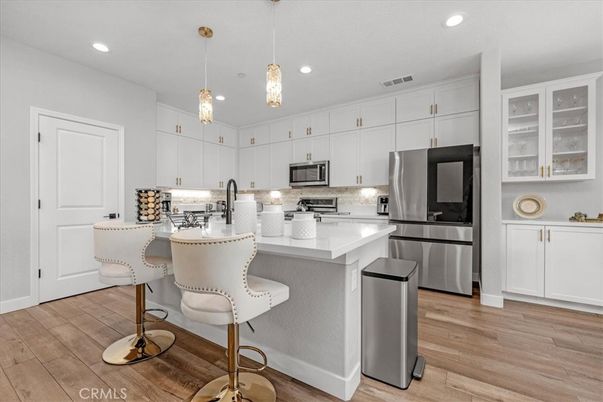 Interior, Kitchen, Pendant Lights, Recessed Lighting, Stainless Steel Appliances, Wood Texture Flooring