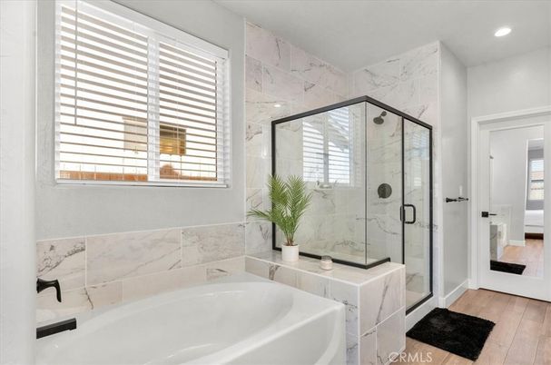 Bathroom, Glass Shower, Interior, Marble Walls, Recessed Lighting, Wood Texture Flooring