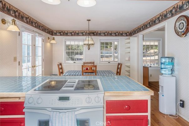 Dining room, Interior, Kitchen, Pendant Lights, Tile Countertops, Wood Texture Flooring