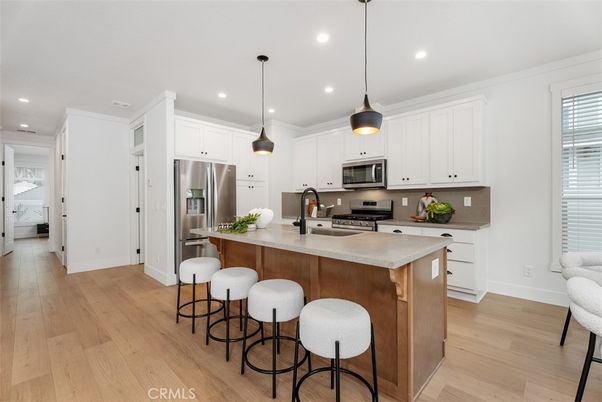 Interior, Kitchen, Pendant Lights, Recessed Lighting, Stainless Steel Appliances, Wood Texture Flooring