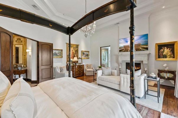 Bedroom, Chandelier, Fireplace, Interior, Recessed Lighting, Wood Texture Flooring