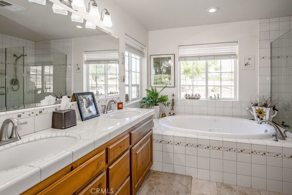 Bathroom, Dual Sink Vanities, Glass Shower, Interior, Recessed Lighting, Tile Countertops