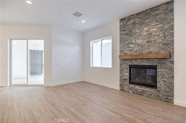 Empty room, Fireplace, Interior, Recessed Lighting, Wood Texture Flooring