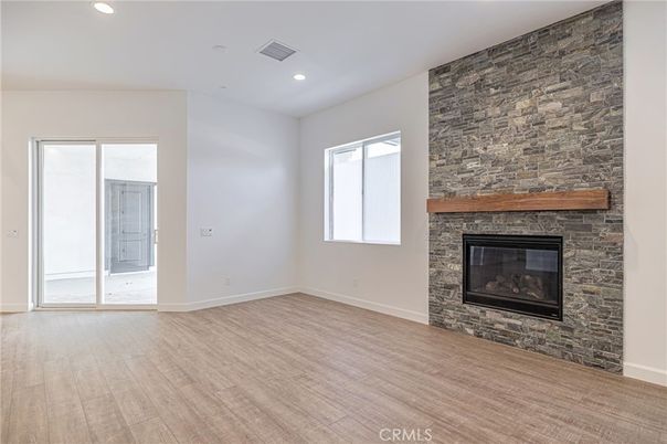 Empty room, Fireplace, Interior, Recessed Lighting, Wood Texture Flooring