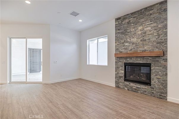 Empty room, Fireplace, Interior, Recessed Lighting, Wood Texture Flooring