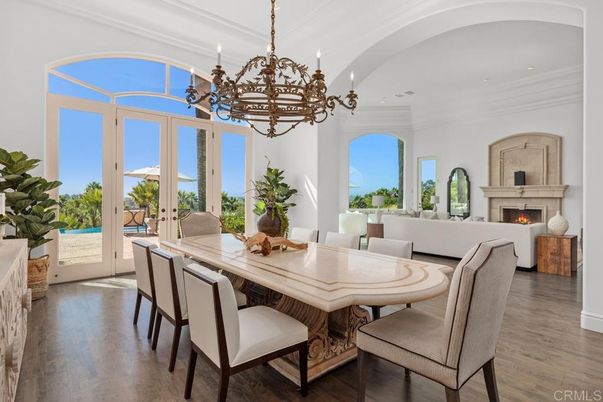 Chandelier, Dining room, Fireplace, Interior, Living room, Recessed Lighting, Wood Texture Flooring