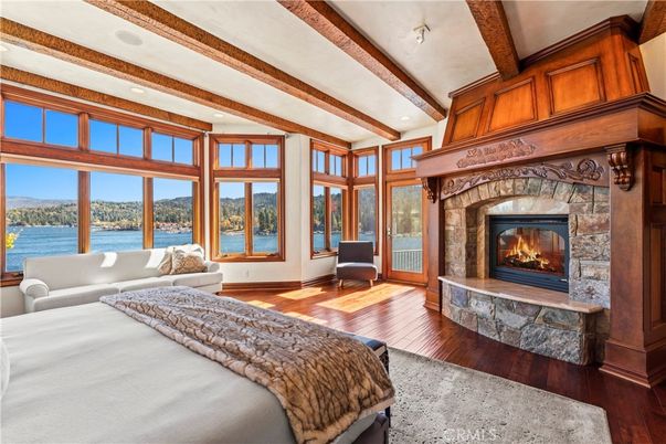 Bedroom, Fireplace, Interior, Recessed Lighting, Water, Wooden Beams, Wood Texture Flooring