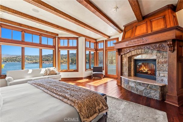 Bedroom, Fireplace, Interior, Recessed Lighting, Water, Wooden Beams, Wood Texture Flooring