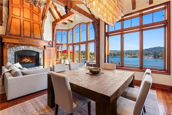 Chandelier, Dining room, Fireplace, Interior, Living room, Water, Wooden Beams, Wood Texture Flooring