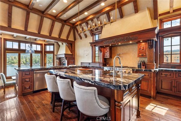 Fireplace, Interior, Kitchen, Pendant Lights, Recessed Lighting, Stainless Steel Appliances, Wooden Beams, Wood Texture Flooring