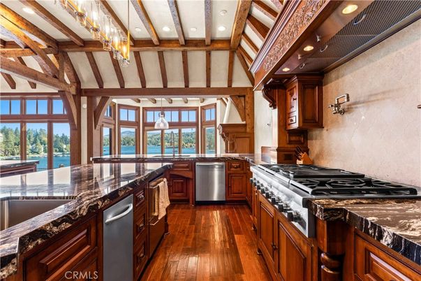 Chandelier, Interior, Kitchen, Pendant Lights, Recessed Lighting, Stainless Steel Appliances, Water, Wooden Beams, Wood Texture Flooring
