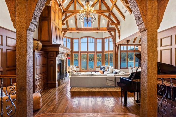 Chandelier, Fireplace, Interior, Living room, Piano, Water, Wooden Beams, Wood Texture Flooring