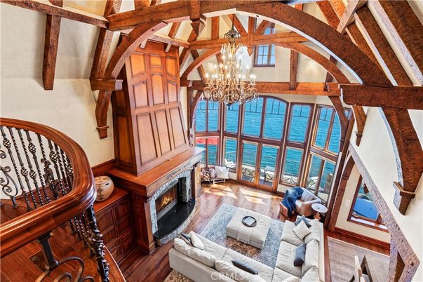 Chandelier, Fireplace, Interior, Living room, Water, Wooden Beams, Wood Texture Flooring