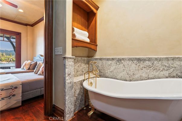 Bathroom, Bedroom, Free Standing Baths, Interior, Recessed Lighting, Wood Texture Flooring