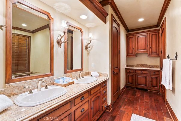 Bathroom, Dual Sink Vanities, Interior, Recessed Lighting, Wood Texture Flooring