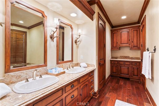 Bathroom, Dual Sink Vanities, Interior, Recessed Lighting, Wood Texture Flooring