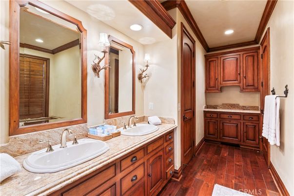 Bathroom, Dual Sink Vanities, Interior, Recessed Lighting, Wood Texture Flooring