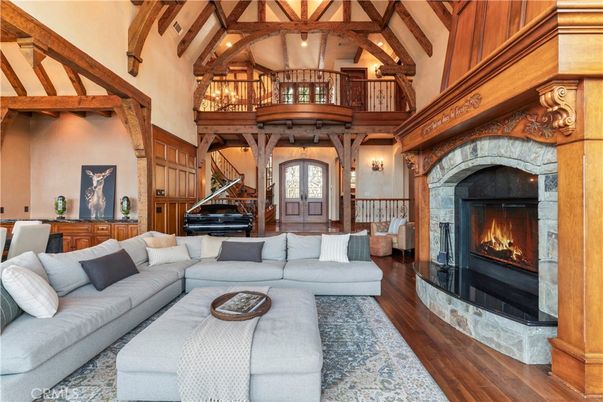 Chandelier, Fireplace, Interior, Living room, Piano, Wooden Beams, Wood Texture Flooring