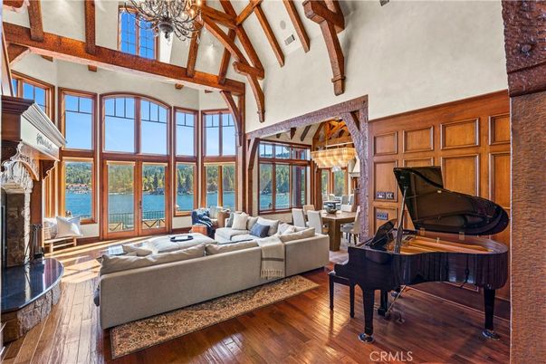 Chandelier, Fireplace, Interior, Living room, Piano, Water, Wooden Beams, Wood Texture Flooring