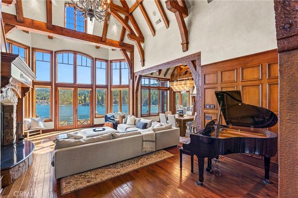 Chandelier, Fireplace, Interior, Living room, Piano, Water, Wooden Beams, Wood Texture Flooring
