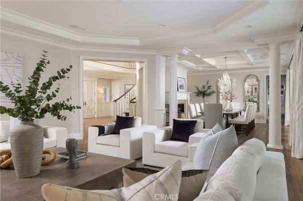 Chandelier, Dining room, Fireplace, Interior, Living room, Recessed Lighting, Wood Texture Flooring