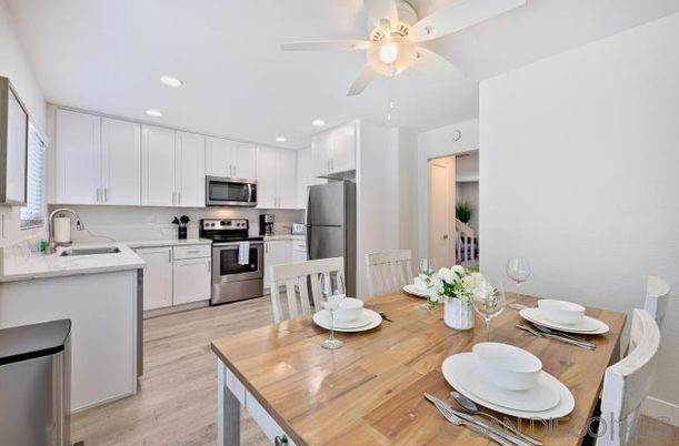 Dining room, Interior, Kitchen, Recessed Lighting, Stainless Steel Appliances, Wood Texture Flooring