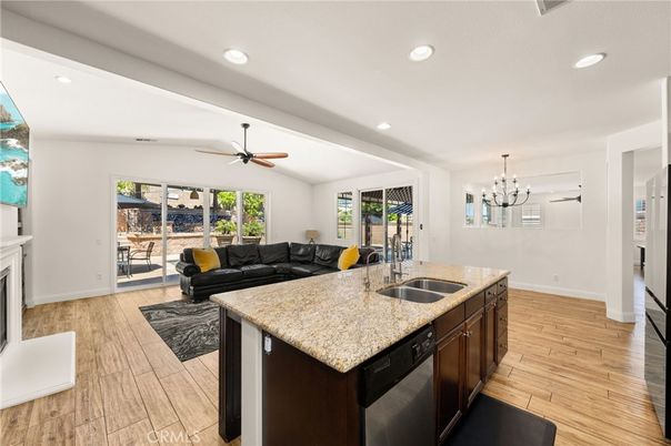 Fireplace, Interior, Kitchen, Living room, Pendant Lights, Recessed Lighting, Wood Texture Flooring