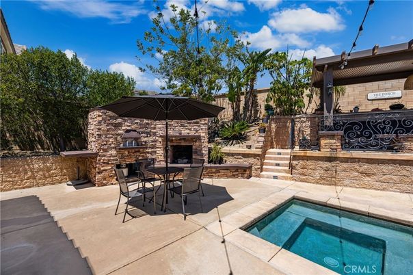 Exterior, Fireplace, Pool