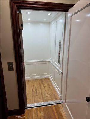 Elevator, Interior, Recessed Lighting, Wood Texture Flooring