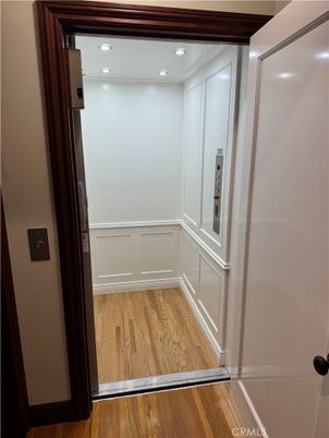 Elevator, Interior, Recessed Lighting, Wood Texture Flooring