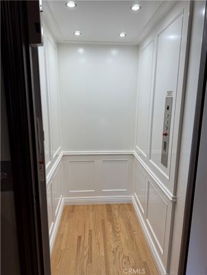 Elevator, Interior, Recessed Lighting, Wood Texture Flooring